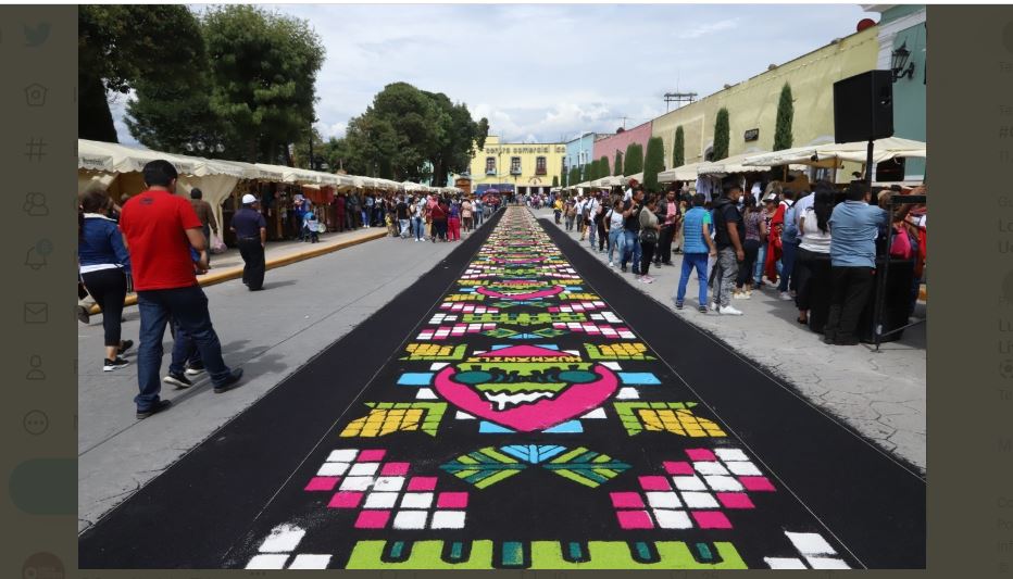 Huamantla impone Récord Guinness por el tapete de aserrín más largo del